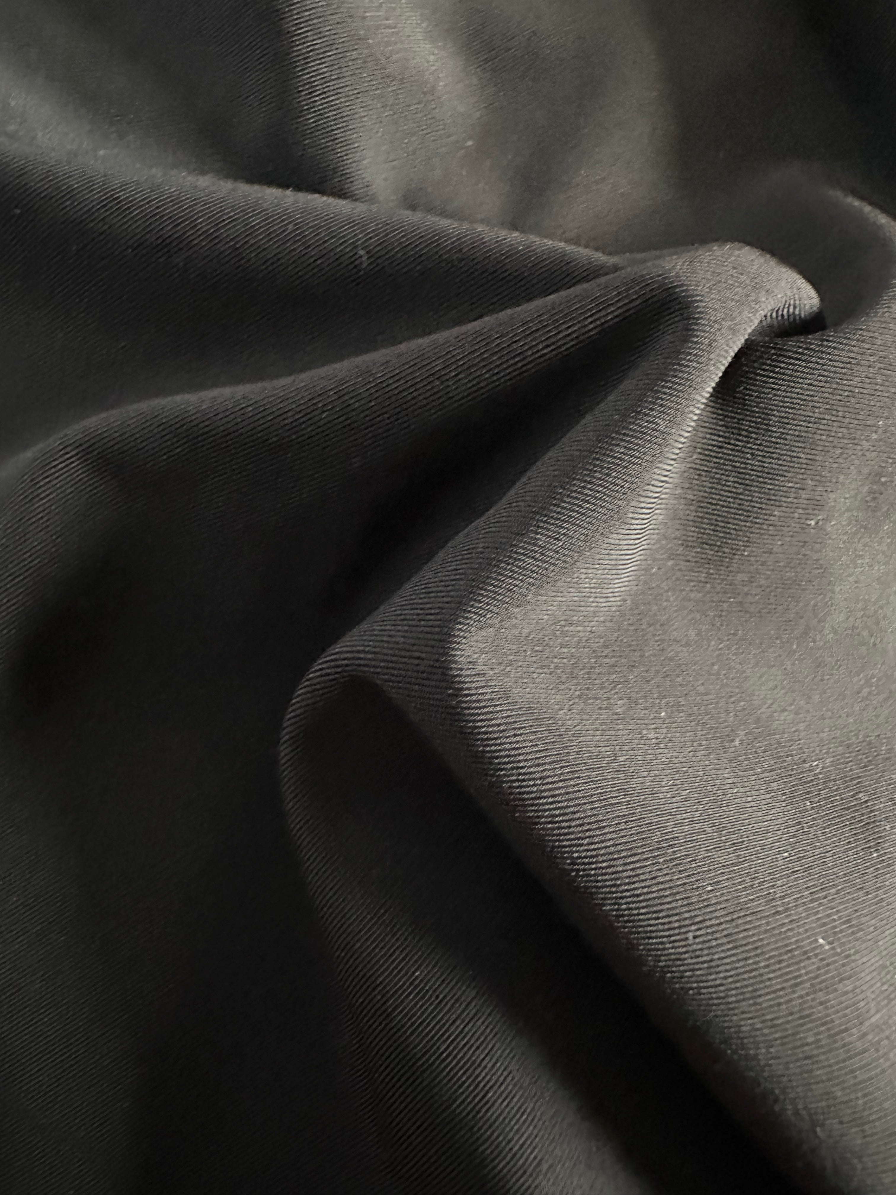 Close-up of HERRA Base black fabric
